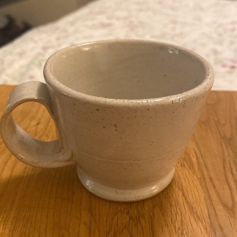 JC Pottery Small cup/mug w/handle cream color stamped with JC in a square shape